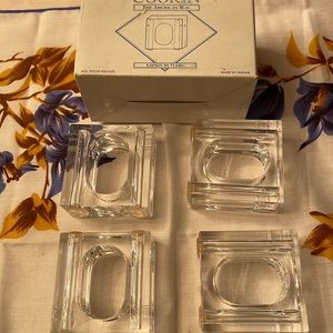 Four vintage Lucite napkin rings